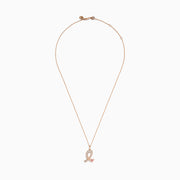 The Novelty 14K Rose Gold Pink Sapphire & Diamond Pink Ribbon Pendant features a diamond pink ribbon with clear gemstones and a single pink sapphire, displayed on a rose gold chain against a plain white background.
