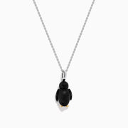 The Seaside 14K Two Tone Gold Diamond Penguin Pendant features black, white, and gold accents with sparkling diamond details for a charming look. Photographed against a plain white background.