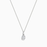 The Classique 14K White Gold Diamond Pendant features a sparkling rectangular-cut diamond with a smaller round diamond above it on a delicate chain, shown against a plain white background.