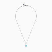 An 18K White Gold Paraiba and Diamond Pendant with an oval Paraiba gemstone and a halo of diamonds hangs from a delicate chain, shown against a plain white background.