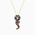 The Safari 14K Yellow Gold Multi Sapphire and Diamond Snake Pendant hangs on a gold chain, featuring sparkling sapphires and a diamond snake design against a plain white background.