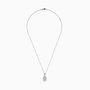 The Classique 14K White Gold Diamond Pendant features a teardrop-shaped diamond centerpiece, surrounded by sparkling diamonds in a sunburst design, suspended on a delicate white gold chain against a white background.