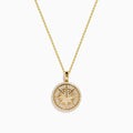 14K yellow gold diamond compass pendant featuring a round medallion with star design and sparkling diamonds around the edge, suspended on a delicate gold chain—a radiant look inspired by the Effy Pendant.
