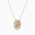 The Doro 14K Yellow Gold Diamond Crossover Pendant (1.03 TCW) features overlapping bands set with sparkling diamonds, elegantly crafted on a gold chain.