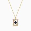 The Casino 14K Yellow Gold Diamond and Sapphire Spade Card Pendant is a yellow gold necklace with a rectangular ace of spades design, diamond accents, and a large sapphire blue spade in the center.