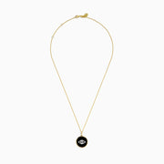 The Novelty 14K Yellow Gold Black Agate and Diamond Evil Eye Pendant features a round black agate with a diamond-studded evil eye on a gold chain, shown against a white background.