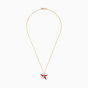 The Seaside 14K Orange Enamel and Diamond Starfish Pendant features a gold chain with an orange enamel starfish charm accented by diamond details, shown against a white background.