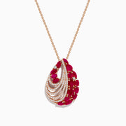 The Ruby Royale 14K Rose Gold Ruby and Diamond Pendant (3.79 TCW) features layered arcs of white diamonds and clusters of vibrant red rubies, all set in a stunning teardrop design.