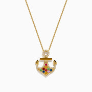 Introducing the Seaside 14K Yellow Gold Multi Sapphire and Diamond Anchor Pendant—a delicate gold necklace featuring a diamond anchor adorned with sapphires and colorful gemstones.