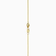 The Novelty 14K Yellow Gold White and Black Diamond Horse Pendant showcases a horse’s head with a detailed mane and sparkling diamond accents, elegantly displayed on a plain white background.