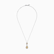 The Canare 14K Two Tone Gold Yellow and White Diamond Pendant features a silver chain with marquise and teardrop shapes set with yellow diamond clusters bordered by sparkling white diamonds.