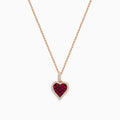 The Ruby Royale 14K Rose Gold Ruby and Diamond Heart Pendant features a ruby heart centerpiece, accented with dazzling diamonds on a rose gold chain.
