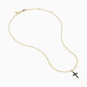 The Novelty 14K Yellow Gold Sapphire and Diamond Cross Pendant features a cross adorned with sapphires and sparkling diamonds, shown on a plain white background.