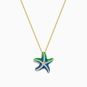 The 14K Yellow Gold Diamond and Enamel Starfish Pendant features green and blue enamel sections on each arm, accented by white diamonds, hanging from a yellow gold chain against a plain white background.