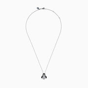 A 14K white gold necklace featuring a penguin pendant accented with diamonds, white sapphires, and black spinel.