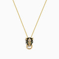 The Signature 14K Yellow Gold Diamond and Rhodium Panther Pendant features black and green details and a circular gold ring in the panther’s mouth.