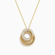 The 14K Yellow Gold Diamond Interlocking Double Circle Pendant features two connected circles—one smooth with diamonds, the other textured—suspended from a delicate gold chain for an elegant look.