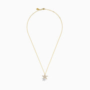 The 14K Two-Tone Gold Diamond Double Starfish Duo Pendant features a gold starfish with sparkling diamonds alongside a silver diamond starfish, creating an elegant, layered necklace look.
