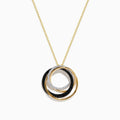 The 14K Yellow Gold Diamond and Black Diamond Circles Pendant features three interlocking rings—yellow gold, black diamond, and silver-toned with small gems—displayed on a white background.