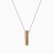 The Canare 14K Two Tone Gold White and Yellow Diamond Pendant features a rectangular design with a vertical row of yellow diamonds bordered by white stones, displayed against a plain white background.