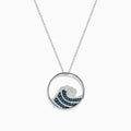 The Seaside 14K White Gold Blue and White Diamond Wave Pendant features a circular design with sparkling gems on a delicate chain, offering an elegant and airy style.
