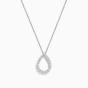 The 925 Sterling Silver Diamond Halo Pear Pendant features a teardrop-shaped design outlined with sparkling clear gemstones, elegantly displayed on a white background.