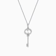 The Novelty 925 Sterling Silver Diamond Key Pendant features a sparkling diamond-encrusted key design on a delicate chain, making it an elegant and eye-catching piece of jewelry.