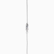 The 14K White Gold Diamond Bezel Halo Pendant features a delicate white gold chain with a round, flower-like diamond pendant, showcasing a central diamond surrounded by a halo of smaller diamonds.