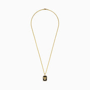 The Men's 14K Yellow Gold Onyx and Diamond Panther Dog Tag Pendant features a rectangular onyx accented with diamonds and a gold panther head set against a black background.