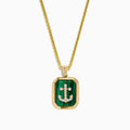 The Men's 14K Yellow Gold Malachite and Diamond Anchor Dog Tag Pendant features a rectangular malachite centerpiece and sparkling diamond accents in a stylish anchor dog tag design.