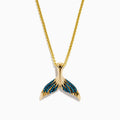 This men's 14K yellow gold necklace features a whales tail pendant accented with blue diamonds on each fin. Both the chain and pendant have a shiny, polished finish.
