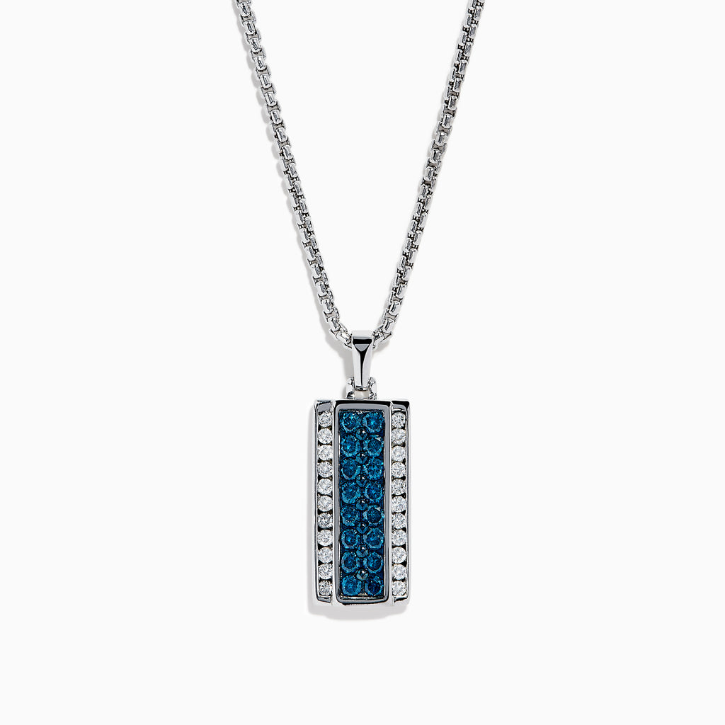 The Men's 14K White Gold White and Blue Diamond Dog Tag Pendant features a silver tag with a vertical row of blue diamonds bordered by clear gemstones, crafted in polished 14K white gold.