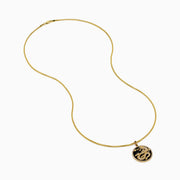 Men's 14K Yellow Gold Onyx and Diamond Dragon Pendant features a raised gold dragon on black onyx, bordered with sparkling diamonds.