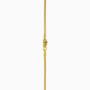 The Novelty 14K Yellow Gold Black and White Diamond Star of David Pendant features a yellow gold chain and pendant with diamond accents, displayed against a white background.