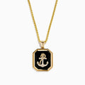 The Men's 14K Yellow Gold Onyx and Diamond Anchor Pendant features a rectangular onyx with a gold and diamond anchor in the center, beveled edges, and a medium-thickness 14K yellow gold chain.