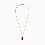 Men's 14K yellow gold dog tag pendant featuring a polished tiger eye center, accented with sparkling diamonds and a gleaming gold border.