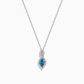 The Bella Bleu 14K Rose Gold Blue and White Diamond Pendant features a marquise-cut blue gemstone accented by white diamonds, suspended from a delicate chain against a white background.