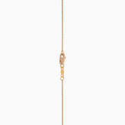The Espresso 14K Rose Gold Brown and White Diamond Pendant features a square design with a central espresso gemstone, surrounded by clear sparkling stones on a rose gold chain.