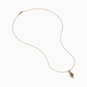 The 14K Rose Gold Brown and White Diamond Pendant features a marquise-shaped brown gemstone at its center, highlighted by a twisting design set with sparkling brown and white diamonds.