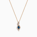 The 14K Rose Gold Blue and White Diamond Pendant features a deep blue oval gemstone with sparkling blue and white diamonds set in a twisting, teardrop-shaped design.