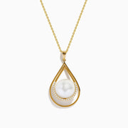 The 14K Yellow Gold Fresh Water Pearl and Diamond Drop Pendant features a teardrop design with a central freshwater pearl, accented by sparkling diamonds in a yellow gold setting.