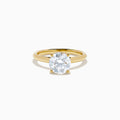 The Star Lab Grown Diamond Vine Ring in 18K yellow gold features a large round lab diamond in a classic prong setting, shown on a white background.