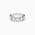 The 18K White Gold Diamond Oval Halo Band Ring showcases large oval-cut diamonds, each surrounded by a sparkling halo of smaller stones, elegantly displayed on a white background.