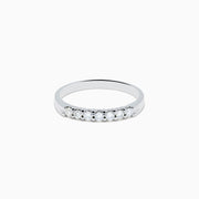 The 14K White Gold 7-Stone Prong Set Diamond Band, 0.25 TCW, showcases a row of seven round diamonds in prong settings across the top, shown on a plain white background.