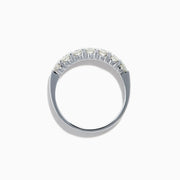 The 14K White Gold 7-Stone Prong Set Diamond Band, 0.75 TCW, showcases seven round diamonds set in a row along the band, displayed on a plain white background.