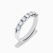 The 14K White Gold 7-Stone Prong Set Diamond Band, 0.75 TCW, showcases seven round diamonds set in a row along the band, displayed on a plain white background.