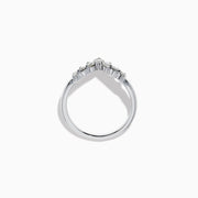 The Classique 14K White Gold Diamond Wedding Band showcases a delicate V-shaped design with sparkling round diamonds elegantly set along the band’s curve.