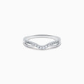 The Classique 14K White Gold Diamond Wedding Band features a subtle chevron shape with small round diamonds along the curved top and a sleek, polished, minimalist design.