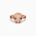 The 14K Rose Gold Oval Solitaire Morganite and Diamond Ring features a large pink morganite centerpiece, accented by two rows of sparkling diamonds along the split shank rose gold band.