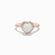 The Aurora 14K Rose Gold Diamond and Opal Heart Ring features a heart-shaped opal center, sparkling diamonds encircling it, and additional diamonds set along the elegant rose gold band.